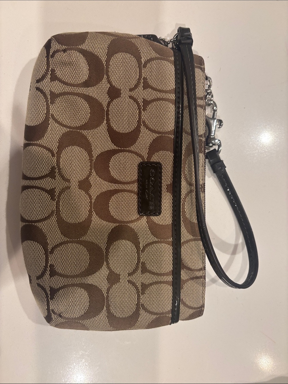 Coach Signature Canvas Wristlet in Brown and Tan